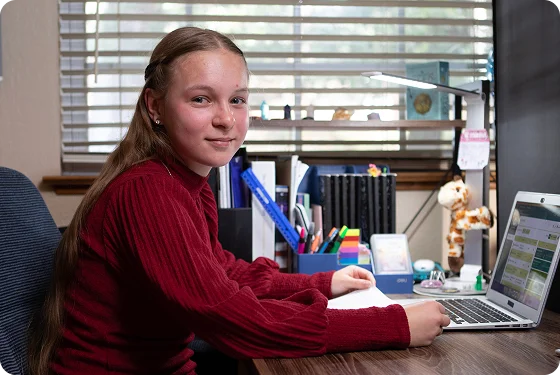 Student working with her laptop
