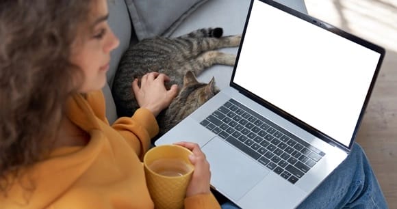 Girl writing on a desk