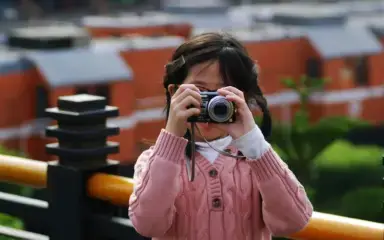 Girl taking a picture