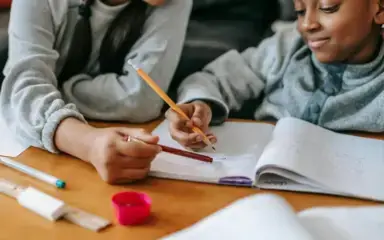 Girl holding a pencil