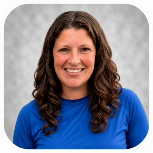 woman with blue shirt smiling